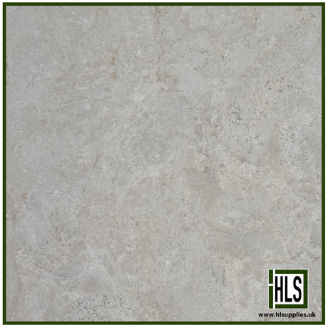 HLSupplies Antiqued Limestone porcelain paving tile in Pearl, featuring a weathered stone texture and soft grey tones.