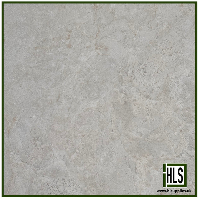 HLSupplies Antiqued Limestone porcelain paving tile in Pearl, featuring a weathered stone texture and soft grey tones.