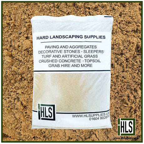 HLSupplies building sand in a white plastic bag, ideal for bricklaying and mortar mixes.
