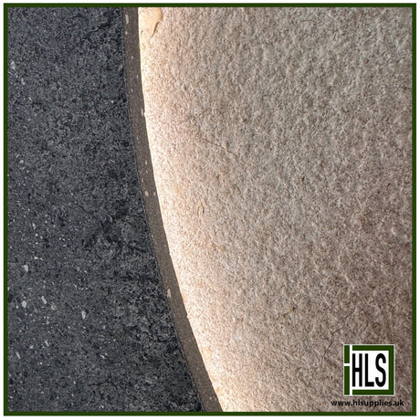 HLSupplies Coreterra porcelain paving slabs showing a textured beige surface next to a dark charcoal terrazzo-style edge