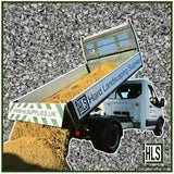 HLSupplies granite dust aggregate, a fine sandy material, being tipped from a tipper truck onto a pile of grey aggregate.
