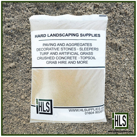 HLSupplies bag of sharp sand, a coarse, light brown aggregate for construction and landscaping.